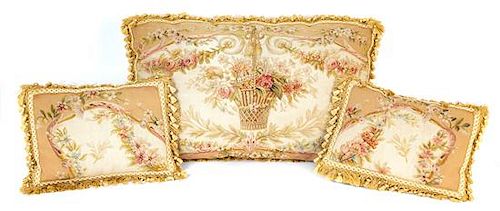A Group of Nine Needlepoint and Aubusson Tapestry Pillows Largest 30 x 15 inches.