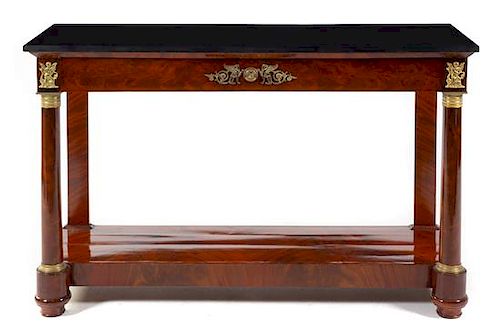 An Empire Mahogany Serving Table Height 33 1/4 x width 54 1/2 inches.