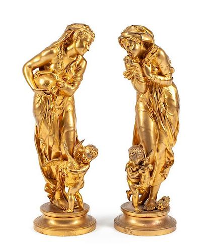A Pair of French Gilt Metal Figural Groups Height 27 1/2 inches.