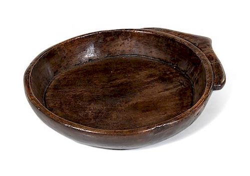 A Provincial Carved Wood Dough Bowl Diameter 24 inches.