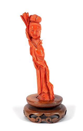 A Chinese Carved Coral Figure of a Lady Height 4 1/2 inches.