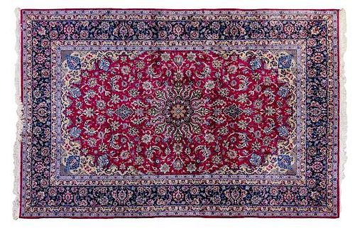 An Isfahan Wool and Silk Rug 10 feet x 6 feet 8 inches.