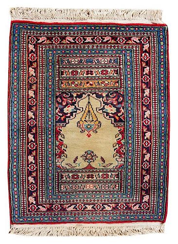 A Persian Wool Mat 2 feet 10 1/2 inches x 2 feet.