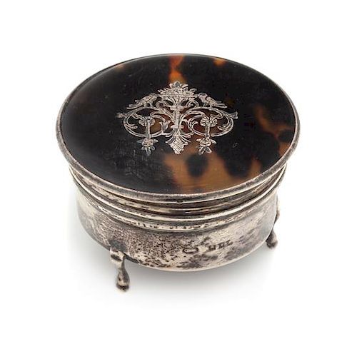 * An Engish Tortoise Shell Mounted Silver Snuff Box, Maker's Mark Obscured, London, 1918, the circular tortoise shell lid center
