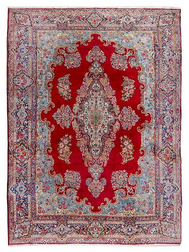 A Tabriz Wool Rug 15 feet 6 inches x 9 feet 10 1/2 inches.