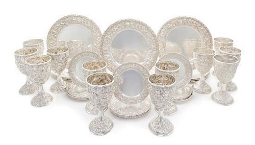 An American Silver Dinner Service, Schofield Silver Co., Baltimore, MD, Early 20th Century, chased with dense flowers and foliag