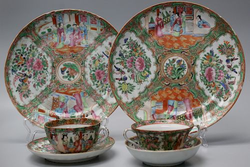 Group of Chinese rose medallion porcelain, includes two large plates and 2 cups and saucers.