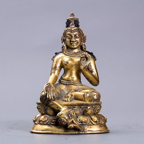 Chinese gilt bronze figure of Buddha. 