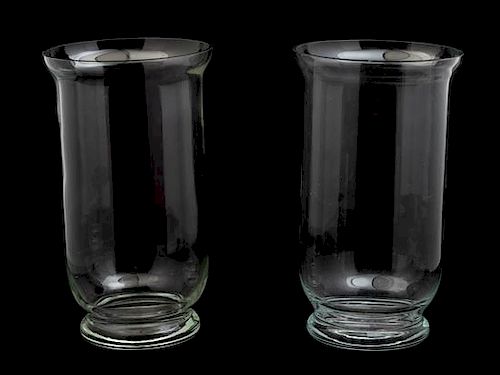 A Pair of Hurricane Glass Vases Height 20 inches.