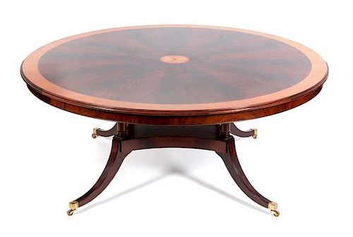 A Regency Style Dining Table Height 31 x diameter 70 inches.