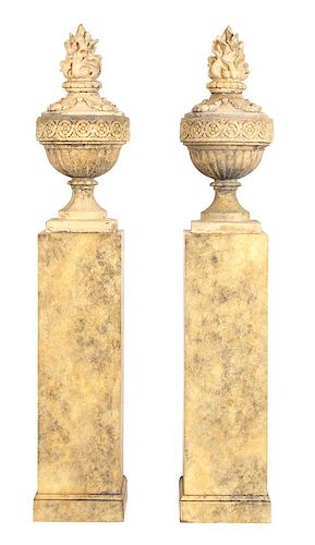 A Pair of English Urns Height of urn 36, overall 89 inches.