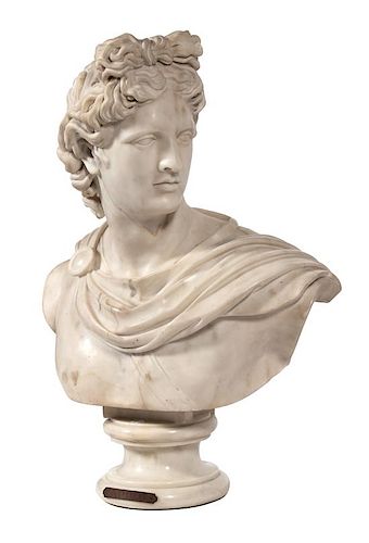 An Italian White Marble Bust of Apollo Height 32 x width 24 inches.