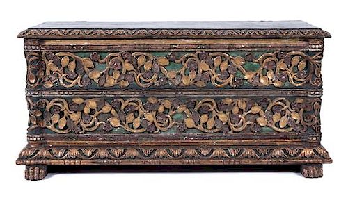 An Italian Baroque Style Painted and Partial Gilt Cassone Height 24 x width 51 x depth 24 inches.