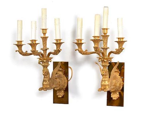 A Pair of Neo-Classical Gilt Bronze Griffon Form Three-Light Wall Sconces Height 16 inches.