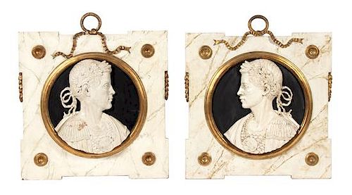 A Pair of Italian Carved and Painted Wood Cameo Plaques Height 25 x width 25 inches.