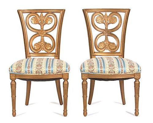 A Set of Four Russian Carved Gilt Painted Side Chairs Height 37 inches.