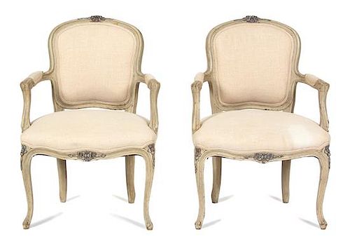 A Pair of Louis XV Style Carved and Painted Fauteuils Height 33 inches.