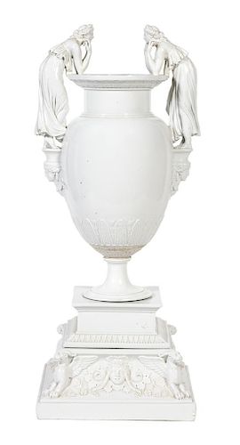A French Glazed Porcelain Urn Height 39 inches.