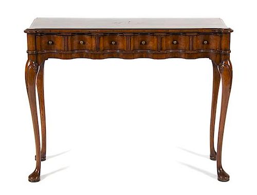 A Georgian Style Figured Mahogany Console Table Height 30 1/4 x width 38 1/2 x depth 12 3/4 inches.