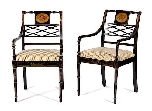 A Pair of Regency Style Ebonized and Parcel Gilt Open Armchairs Height 36 1/2 inches.