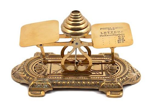 An English Brass Postal Scale Height 6 x width 9 x depth 5 inches.