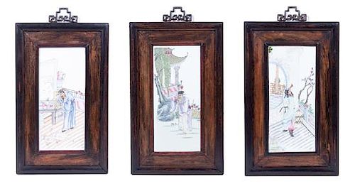 A Set of Three Chinese Enameled Porcelain Plaques Plaque size: 15 x 6 5/8 inches.