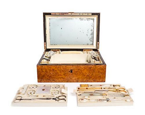 An Impressive French Gold and Mother-of-Pearl Sewing Box, Height of box 4 1/4 x width 10 5/8 x depth 7 3/8 inches.