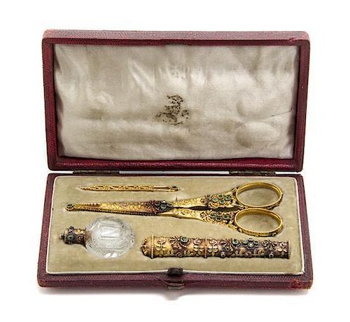 A Vari-Color Gold and Emerald-Mounted Necessaire, Length of scissors 4 inches.