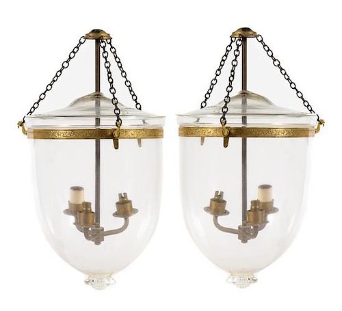 A Pair of Regency Style Gilt Metal and Glass Hall Lanterns Height 41 inches.