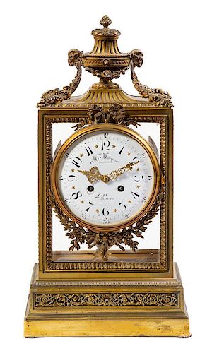 A Napoleon III Gilt-Bronze Mantel Clock Height 22 inches.