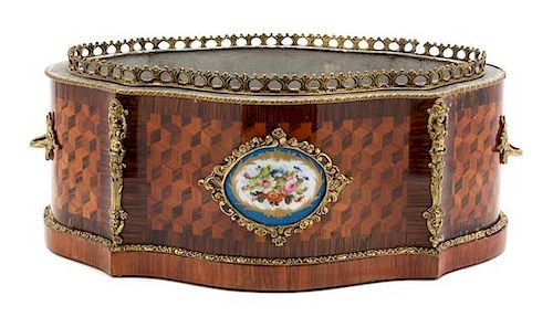 A Louis Philippe Porcelain-Mounted Parquetry Cartouche-Form Jardiniere Height 7 inches x width 17 x depth 10 3/4 inches.