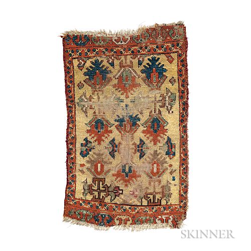 Central Anatolian Yastik, Turkey, early 19th century, (heavily damaged), 2 ft. 9 in. x 1 ft. 8 in.  Provenance:  The Ronni...
