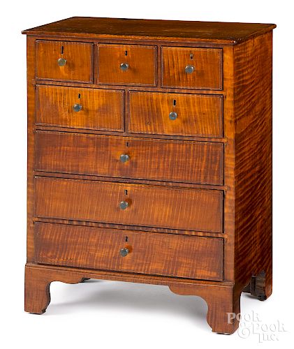 Child's tiger maple chest of drawers
