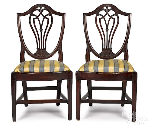 Pair of Federal carved mahogany shieldback dining chairs