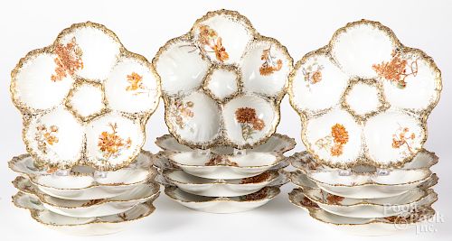 Set of twelve Limoges porcelain oyster plates