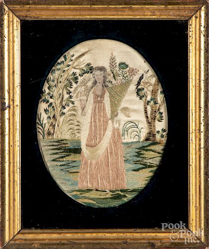 Embroidered picture of a woman with cornucopia