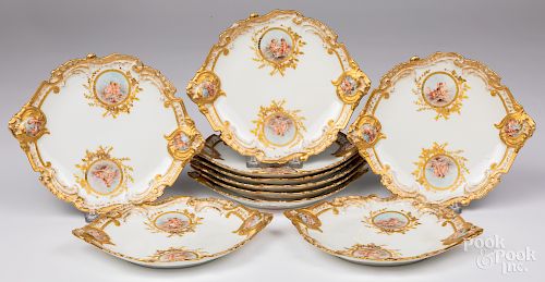 Set of ten French painted porcelain plates