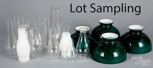 Collection of glass lamp shades and chimneys