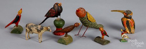 Eight carved and painted animals