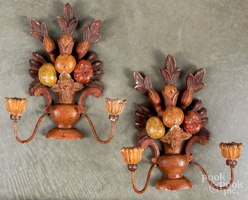 Pair of carved urn and fruit wall sconces