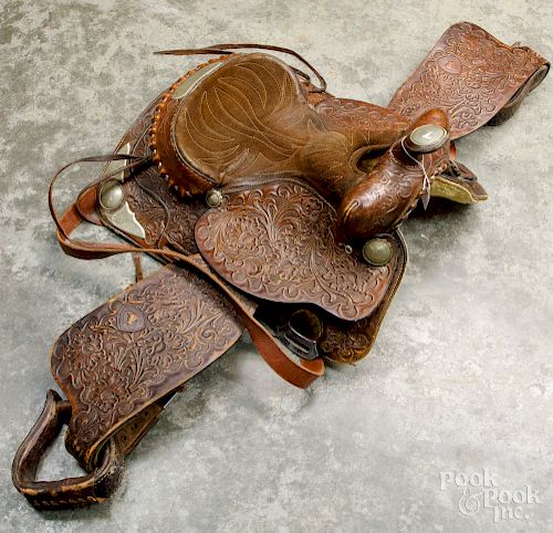 Tooled leather horse saddle