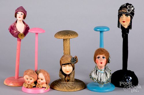 Five painted composition flapper doll hat stands