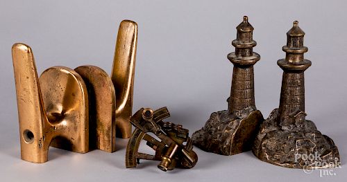 Two contemporary brass lighthouse bookends, etc.