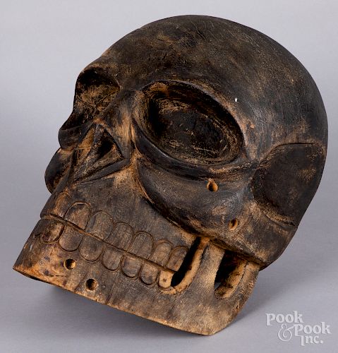 Contemporary carved wood skull
