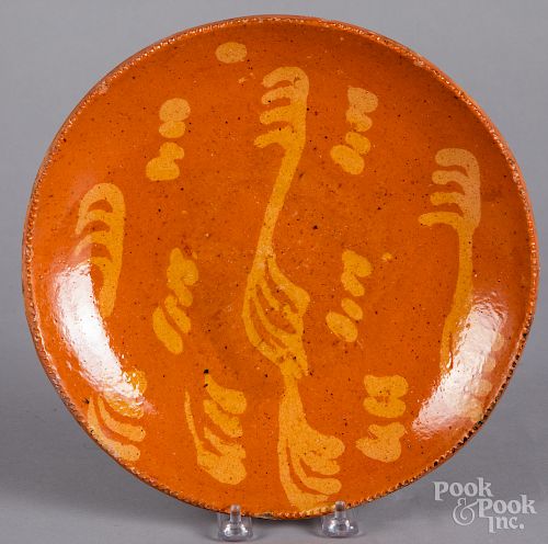 Pennsylvania slip decorated redware plate