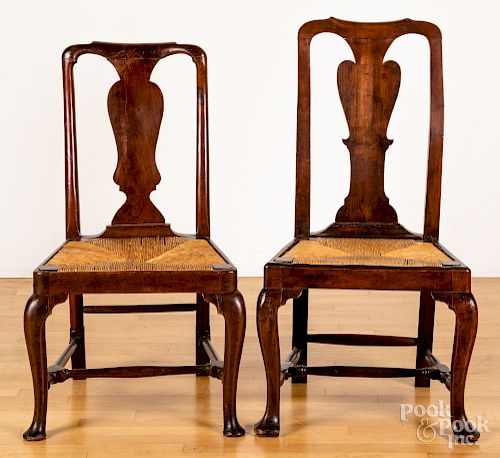 Two George II mahogany rush seat dining chairs