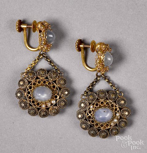 Pair of 14K gold star sapphire drop earrings