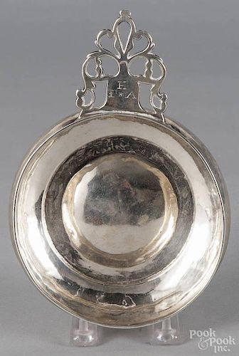 American silver porringer, mid 18th c., with a pierced handle, monogrammed I H A, 5 3/4'' dia.
