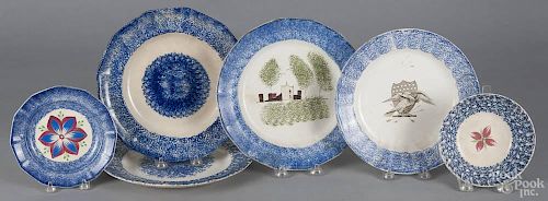 Six pieces of blue spatterware, 19th c., to include a fort plate, 9 3/4'' dia., an eagle and shield