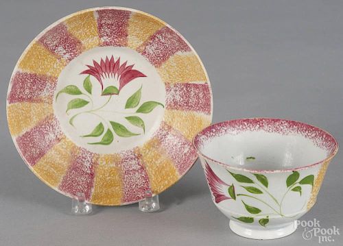 Red and yellow rainbow spatter thistle cup and saucer, 19th c. Provenance: An Alexandria, Virginia